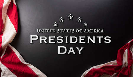 Happy presidents day concept made from flag of the United States and the text on dark  background.の写真素材