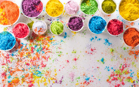Happy Holi decoration, the indian festival.Top view of colorful holi powder on white background.の写真素材