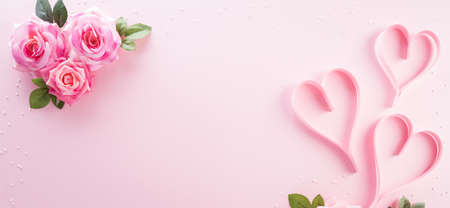 Happy Mother's Day decoration concept made from rose flower and pink hearts with on pastel background.の写真素材