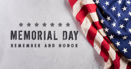 Happy Memorial day concept made from american flag with the text on white stone background.の写真素材
