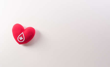 World blood donor day, red cross and nurse day concept made from red heart on white background.の写真素材
