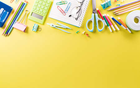 Education or back to school Concept. Top view of Colorful school supplies with books, color pencils,...