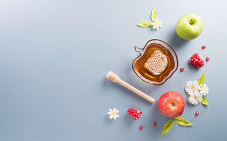 Rosh hashanah (Jewish New Year holiday), Concept of traditional or religion symbols on pastel background.の写真素材