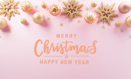 Christmas and new year background concept. Top view of Christmas ball, star and snowflake on pastel pink background.の写真素材