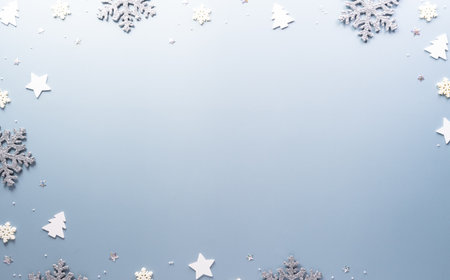 Christmas and new year background concept. Top view of Christmas star and snowflake on pastel blue background.の写真素材