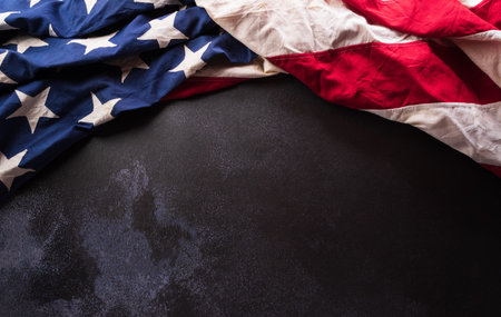 Happy Presidents day concept made from American flag and on dark stone background.の写真素材