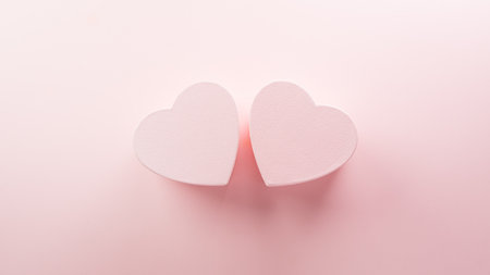 Happy valentine's day and love decoration background concept made from two hearts on pastel pink background.の写真素材