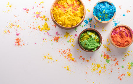 Happy Holi decoration, the indian festival.Top view of colorful holi powder on white background.の写真素材