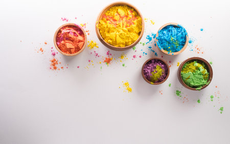 Happy Holi decoration, the indian festival.Top view of colorful holi powder on white background.の写真素材