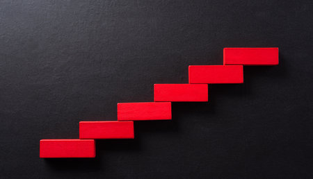 Concept of building success foundation. Yellow wooden block stacking as step stair, Success in...