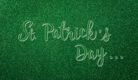 Happy St Patrick's Day decoration background concept made from green glitter paper and the text.の写真素材