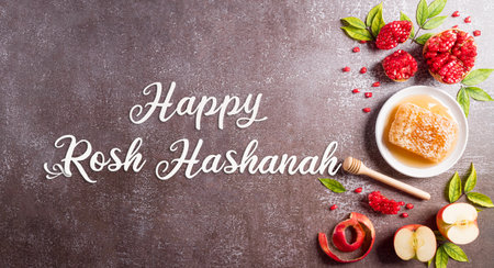 Rosh hashanah (Jewish New Year holiday), Concept of traditional or religion symbols on dark stone background.の写真素材