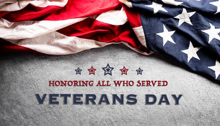 Happy Veterans day concept made from American flag and the text on dark stone background.の写真素材