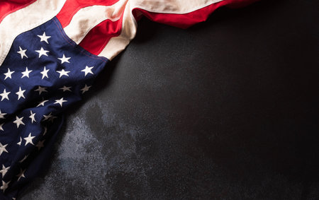 Happy Veterans day concept made from American flag on dark stone background.の写真素材