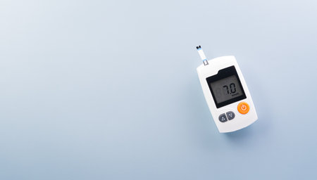 World Diabetes day concept ,14 November. Top view of blood glucose meter sets on pastel blue background,の写真素材