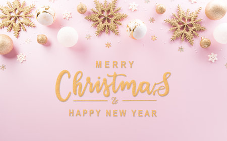 Christmas and new year background concept. Top view of Christmas ball, star and snowflake on pastel pink background.の写真素材
