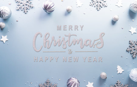 Christmas and new year background concept. Top view of Christmas star and snowflake on pastel blue background.の写真素材