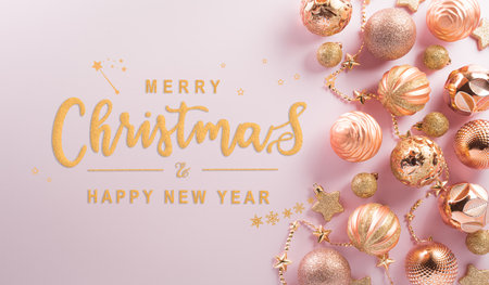 Christmas and new year background concept. Top view of Christmas ball, star and snowflake on pastel pink background.の写真素材