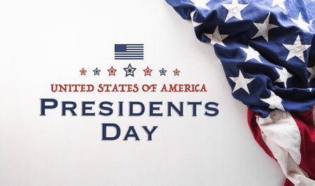 Happy Presidents day concept made from American flag and the text on white wooden background.の写真素材