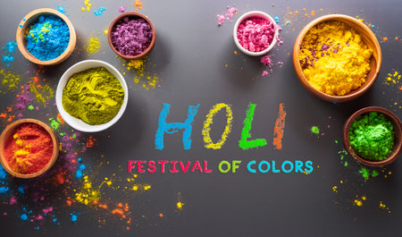 Happy Holi decoration, the indian festival.Top view of colorful holi powder and the text on dark background.の写真素材