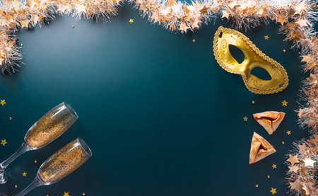 Happy Purim carnival decoration concept made from golden mask star and glitter on dark background. (Happy Purim in Hebrew, jewish holiday celebrate)の写真素材