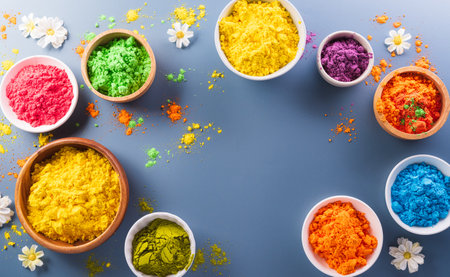 Happy Holi decoration, the indian festival.Top view of colorful holi powder on dark blue background.の写真素材
