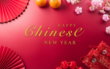 Chinese new year decorations background concept made from red packet, orange and plum blossom.の写真素材