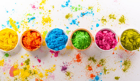 Happy Holi decoration, the indian festival.Top view of colorful holi powder on white background.の写真素材