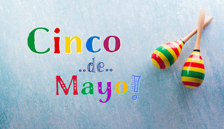 Cinco de Mayo holiday background made from maracas and the text on pastel background.の写真素材