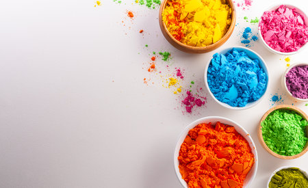 Happy Holi decoration, the indian festival.Top view of colorful holi powder on white background.の写真素材