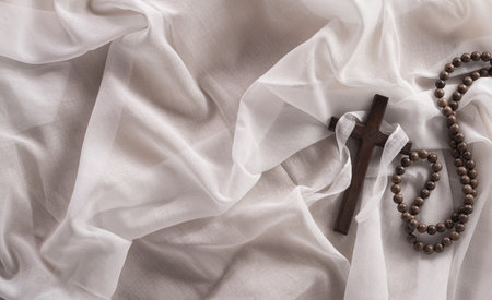 Good Friday and Holy week concept - A religious cross on white fabric background.の写真素材