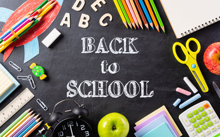 Education or back to school Concept. Top view of Colorful school supplies with books, color pencils,...