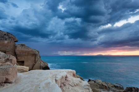 Egadi islands: sunrise on the sea, dramatic cloudsの写真素材