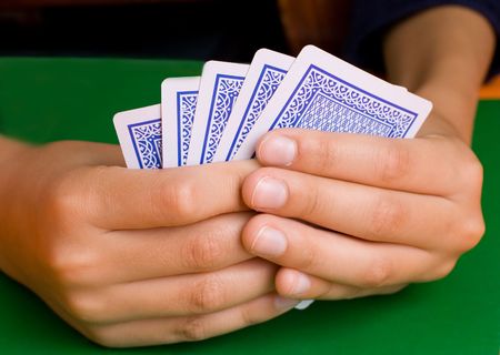 cards and  on a green cloth
