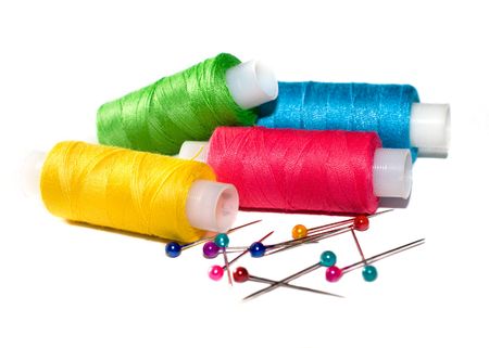 Coils of colour threads isolated on white (selective focus)
