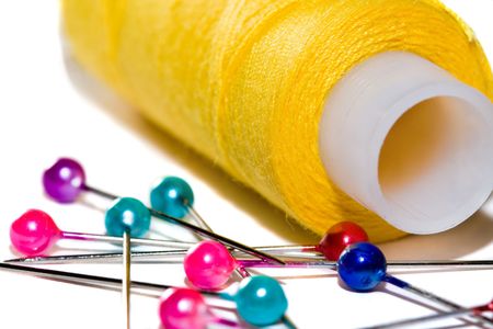 Coils of colour threads isolated on white (selective focus)の写真素材