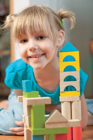 child plays with toy blocksの写真素材