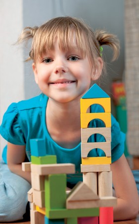 child plays with toy blocksの写真素材