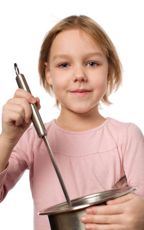 Happy chef girl stirring soup. isolated on whiteの写真素材