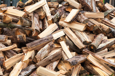 stack of firewood prepared for winterの写真素材