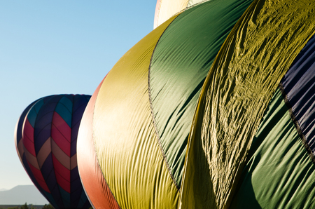 Hot air baloons in flight in the skyの写真素材