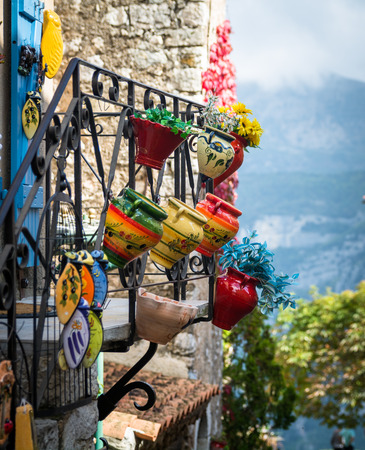Colorful bright local pottery craft on sale in rural France.の写真素材