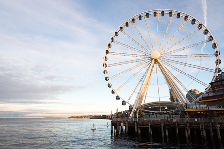 Sunset view of Ferris wheel in Seattle in the morningの写真素材