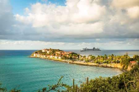 Cruise ship on the horizon with tropical resort of Sint Maartenのeditorial素材