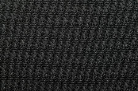 Close-up polyester fabric texture of black athletic shirtの写真素材