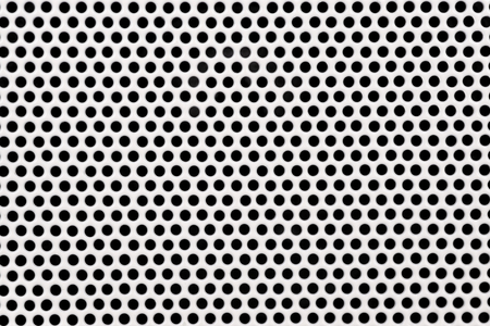 Technology background with circle perforated speaker texture grillの写真素材