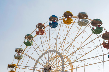 Vintage ferris wheel over skyの写真素材