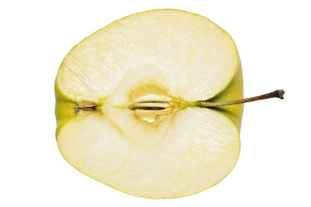 Half of juicy green apple on a white backgroundの写真素材