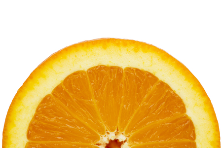Orange slice half on a white backgroundの写真素材