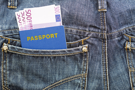 Passport with euros in jeans pocketの写真素材